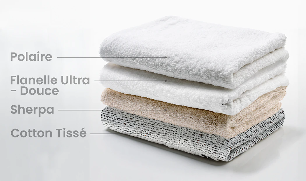 Pile de serviettes moelleuses personnalisées : polaire, flanelle, sherpa et coton tissé, pour un confort sur mesure.
